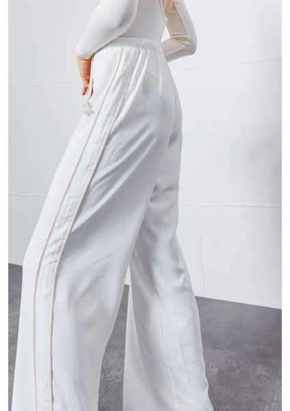 Ekru Yanları Şerit Biyeli Kordon Ip Detaylı Dökümlü Pantolon fiyatları