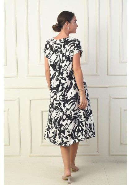 Kadın V Yaka Soyut Desenli Viskon Elbise fırsatları