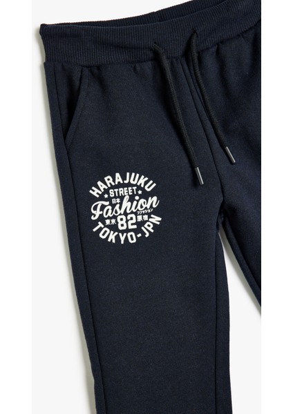 Jogger Eşofman Altı Baskı Detaylı Cepli Beli Bağlamalı modelleri