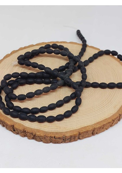 Çeyrek Dizi (9cm Uzunluğundadır!) Onix Taşı Arpa Kesim Çeyrek Dizi 6*8.5mm (49968) fırsatları