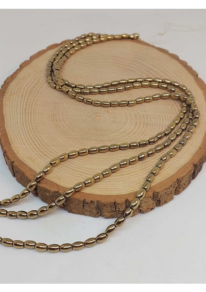 Çeyrek Dizi (9cm Uzunluğundadır!) Hematit Taşı Arpa Kesim Çeyrek Dizi 4*5.5mm (49634) fırsatları