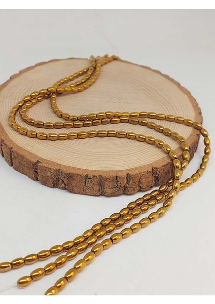 Çeyrek Dizi (9cm Uzunluğundadır!) Hematit Taşı Arpa Kesim Çeyrek Dizi 4*5.5mm (49642) fırsatları