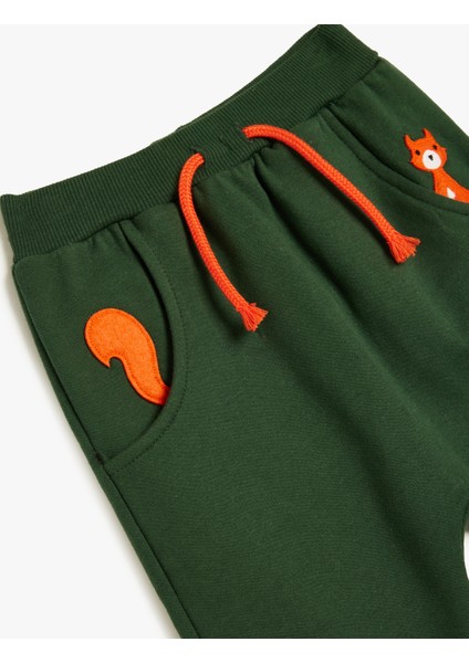 Jogger Eşofman Altı Beli Bağcıklı Aplike Detaylı Hayvan Baskılı Cepli Pamuklu modelleri