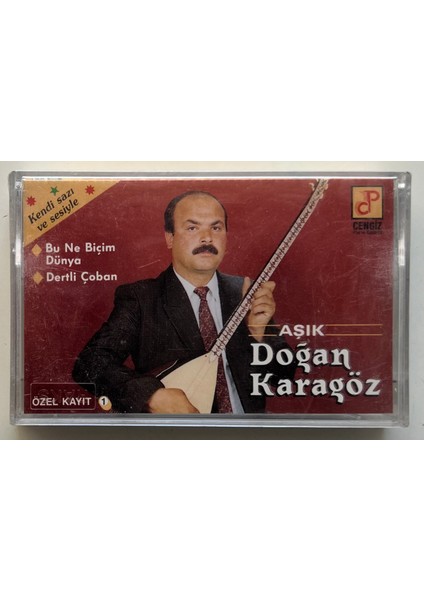 Aşık Doğan Karagöz Bu Ne Biçim Dünya Kaset (Jelatininde Orjnal Dönem Kağıt Baskı Kaset)