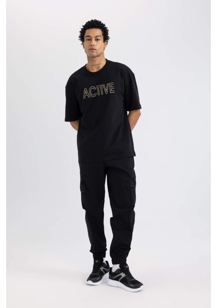 Fit Oversize Geniş Kalıp Bisiklet Yaka Nakışlı Kısa Kollu Tişört C1426AX24SM fiyatları