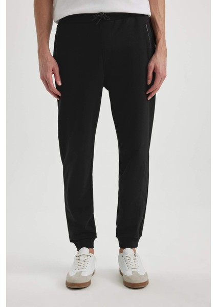 Eşofman Altı Slim Fit Dar Kesim Basic Düz Beli Bağcıklı Esnek Paça Fermuar Cepli A6499AX24SP