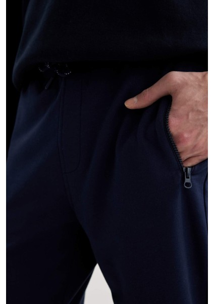 Eşofman Altı Slim Fit Dar Kesim Basic Düz Beli Bağcıklı Esnek Paça Fermuar Cepli A6499AX24SP