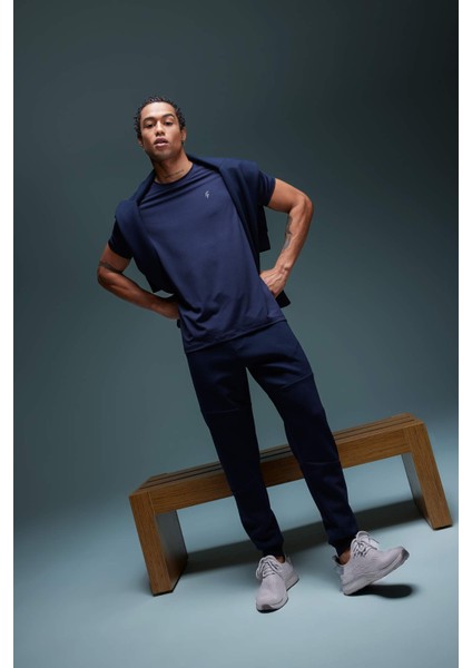 Fit Sporcu Jogger Eşofman Altı Slim Fit Dar Kesim Çift Cepli Beli Paçası Lastikli Skuba Dalgıç Kumaş B4761AX24SP fiyatları