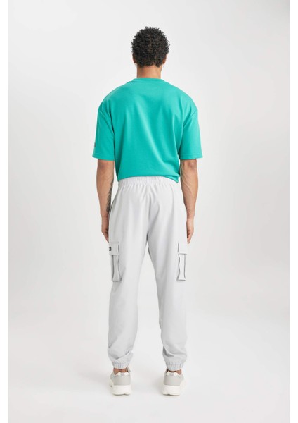 Fit Sporcu Jogger Eşofman Altı Standart Fit Kargo Cepli Dokuma Beli Paçası Lastikli C0043AX24SP