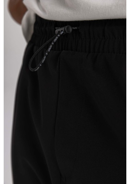 Fit Sporcu Jogger Eşofman Altı Standart Fit Kargo Cepli Dokuma Beli Paçası Lastikli C0043AX24SP