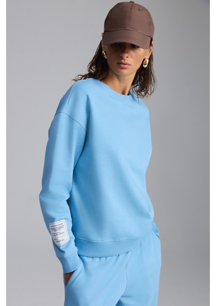 Sahıan Kadın Organik Pamuk 3 Iplik Içi Şardonlu Kol Etiket Detaylı Regular Mavi Sweatshirt