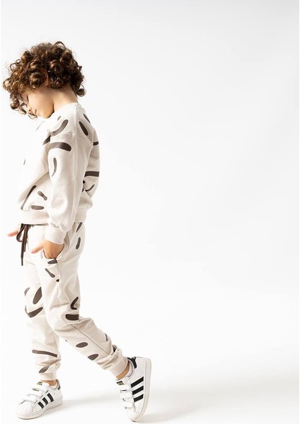 Fırçalı Özel Kumaş Gülücük Baskılı Unitex çocuk takım - Krem