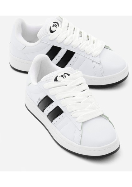 Kadın Beyaz Siyah Termo Taban Yanı Şeritli Bağcıklı Spor Ayakkabı modelleri