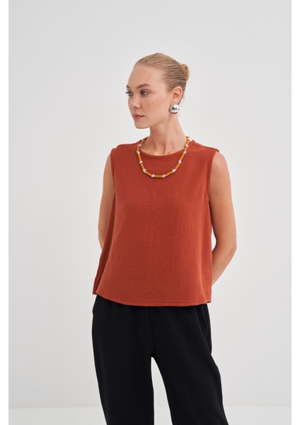 Kadın Müslin Kolsuz Bluz fiyatları