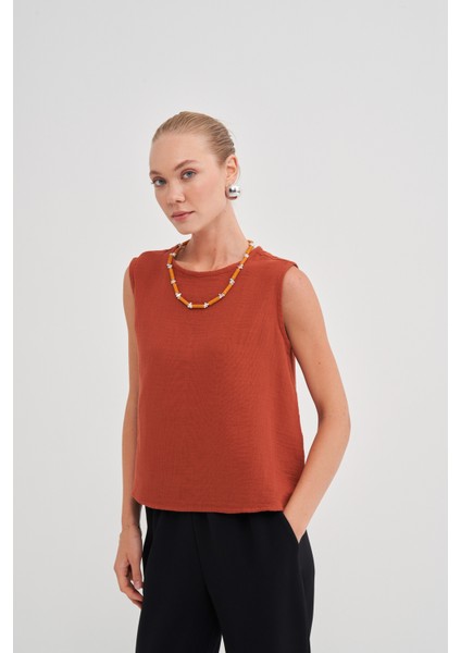 Kadın Müslin Kolsuz Bluz indirimleri