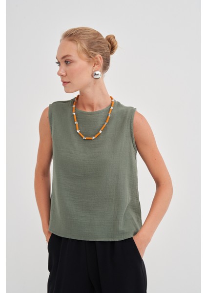 Kadın Müslin Kolsuz Bluz indirimleri