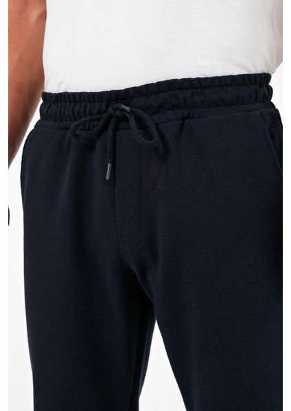 Kalın Lacivert Erkek Eşofman Altı Jogger Arka Cepli Paça Lastikli Regular Fit Şardonsuz modelleri