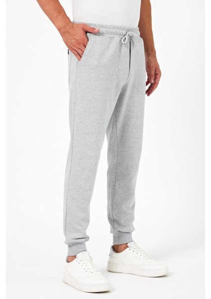 Kalın Gri Erkek Eşofman Altı Jogger Arka Cepli Paça Lastikli Regular Fit Şardonsuz modelleri