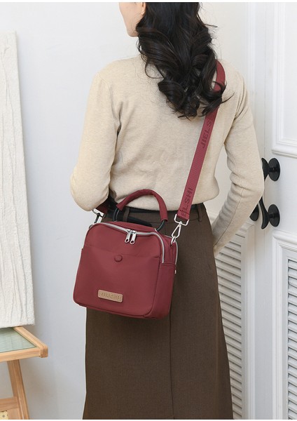 Çapraz Askılı Çanta Taşınabilir Yüksek Kaliteli Aşınmaya Dayanıklı Naylon Kumaş Düz Renk ve Sade Stil, Mor (Yurt Dışından) modelleri