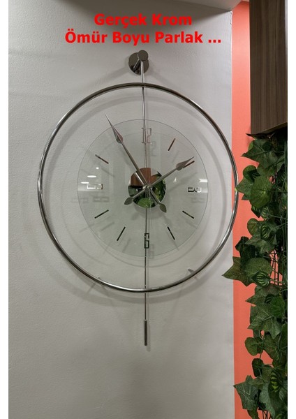 Modern büyük cam duvar saati, gümüş renk, şeffaf tasarım, 60x80 cm, şık dekorasyon. fiyatları