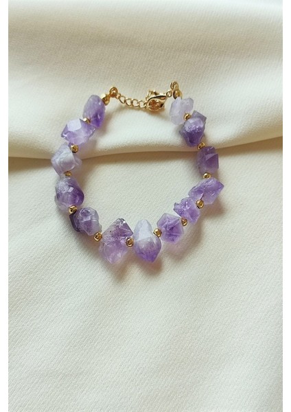 Mor doğal ametist taş bileklik, sertifikalı ve şık tasarım.