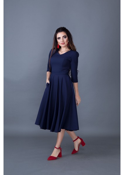 Truvakar Kol V Yaka Cepli Dokuma Dökümlü Kumaş Kloş Midi Boy Elbise fiyatları