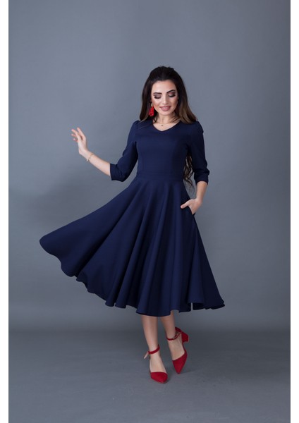 Truvakar Kol V Yaka Cepli Dokuma Dökümlü Kumaş Kloş Midi Boy Elbise indirimleri