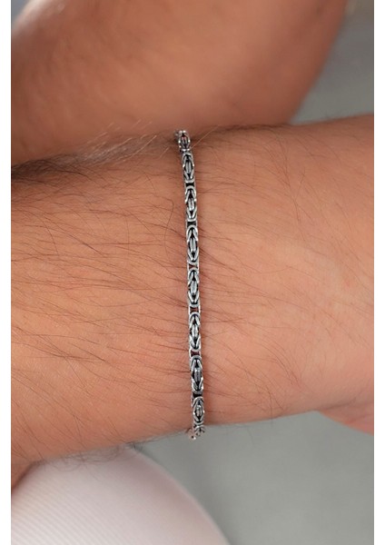 925 ayar gümüş erkek zincir ve bileklik, zirkon taş detaylarıyla şık tasarım fiyatları