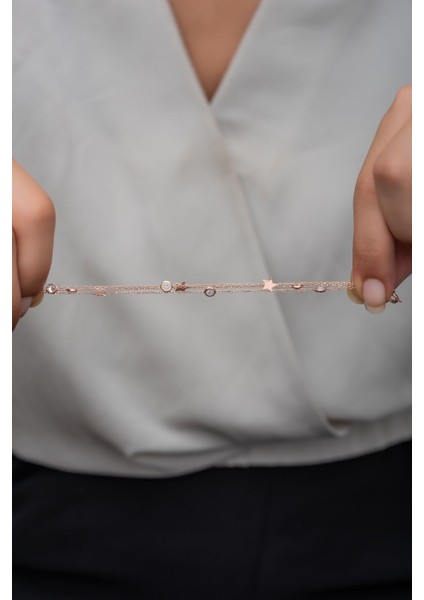 Pembe zirkon taşlı 925 ayar gümüş yıldız bileklik, şık ve zarif tasarım fırsatları