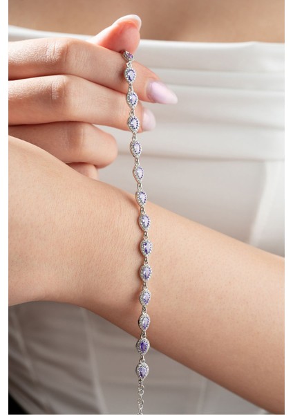 Mor zirkon taşlı, rodyum kaplı, sıralı şık bileklik