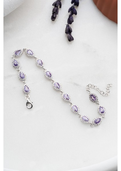 Mor zirkon taşlı, rodyum kaplı, sıralı şık bileklik fiyatları