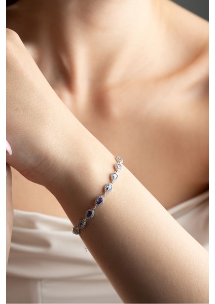 Mor zirkon taşlı, rodyum kaplı, sıralı şık bileklik fırsatları