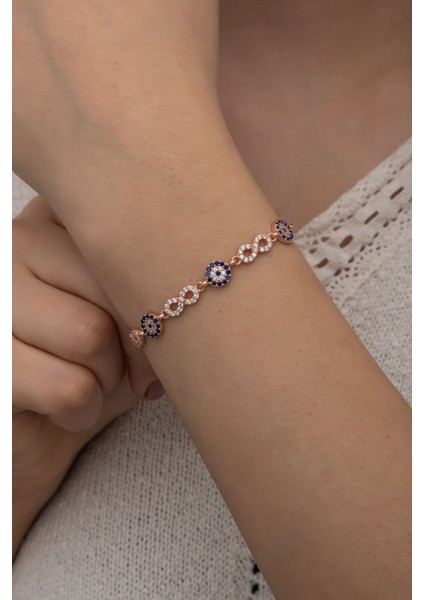 925 ayar gümüş bileklik, zirkon taşlı, pembe renk, nazar boncuğu ve sonsuzluk detaylı fiyatları