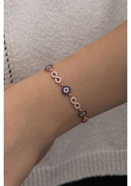 925 ayar gümüş bileklik, zirkon taşlı, pembe renk, nazar boncuğu ve sonsuzluk detaylı modelleri