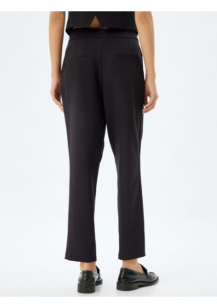 Koton Havuç Kesim Kumaş Pantolon Yüksek Bel Cepli 5WAK40097UW fırsatları