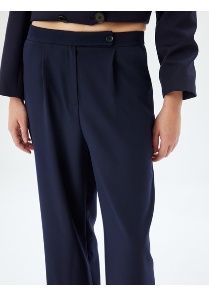 Havuç Kesim Kumaş Pantolon Pile Detaylı indirimleri