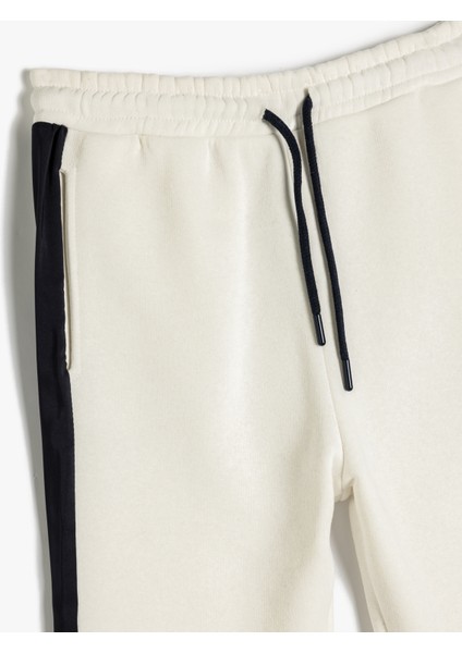 Jogger Eşofman Altı Beli Bağlamalı Cepli Renk Bloklu Dikiş Detaylı fırsatları