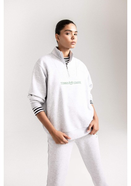 DeFacto Fit Oversize Geniş Kalıp Dik Yaka Spor Baskılı Sporcu Sweatshirt D1701AX24AU