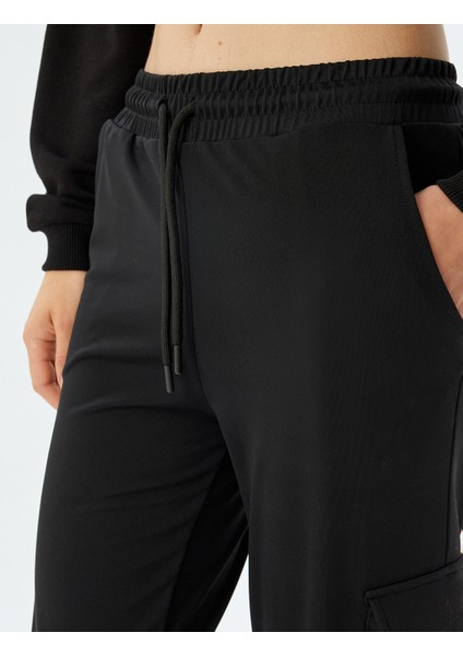 Jogger Eşofman Altı Yüksek Bel Bağcıklı Cep Detaylı Bol Kalıp