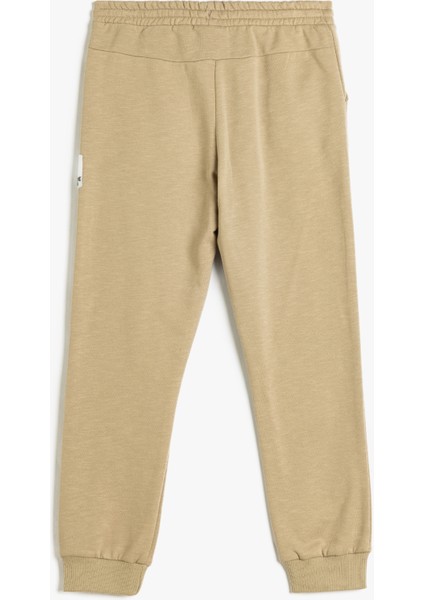 Jogger Eşofman Altı Beli Bağlamalı Şardonlu Pamuklu fiyatları