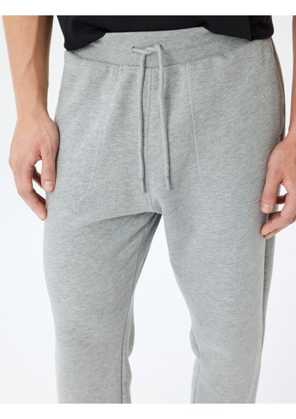 Spor Eşofman Altı Jogger Beli Bağcıklı Cep Detaylı Pamuk Karışımlı indirimleri
