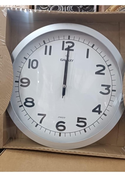 Modern sarı yuvarlak duvar saati, şık ve kullanışlı ev dekoru, 25x25 cm.