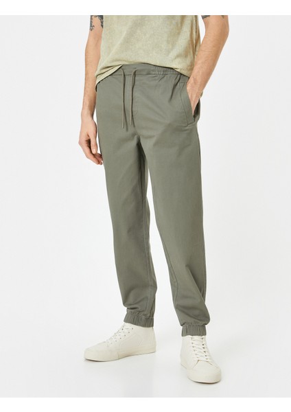 Jogger Pantolon Slim Fit Chino Beli Bağcıklı Cep Detaylı modelleri