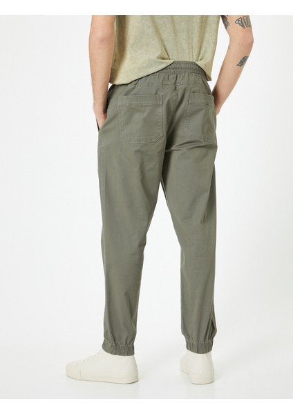 Jogger Pantolon Slim Fit Chino Beli Bağcıklı Cep Detaylı fırsatları