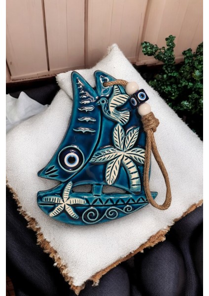 Nazar Boncuklu Seramik Yelkenli Desenli Kuş Palmiye ve Deniz Yıldızı Dekoratifli Süs Eşyası 16X20 cm modelleri