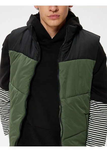 Şişme Yelek Dik Yaka Slim Fit Fermuarlı Renk Bloklu Cep Detaylı indirimleri