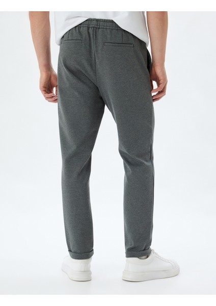 Beli Bağcıklı Pantolon Cep Detaylı fırsatları