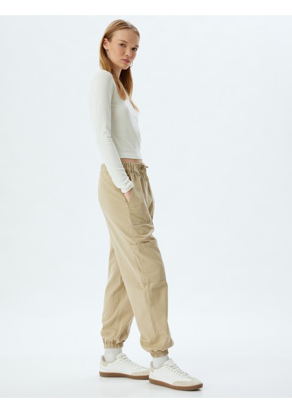Jogger Pantolon Kargo Cepli Beli Bağcıklı Slim Fit fiyatları