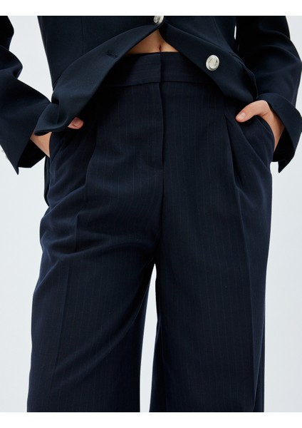 Yüksek Bel Geniş Paça Kumaş Pantolon Pile Detaylı Cepli indirimleri