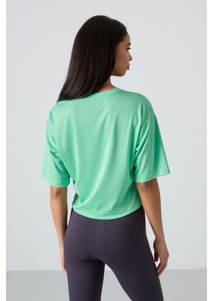 Su Yeşili Polyester Nefes Alan Dokulu İnce Esnek Oversize Fit Performans Kadın T-Shirt - 97284